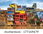 Chaotic colorful houses on the banks of river Ganges, Varanasi, India