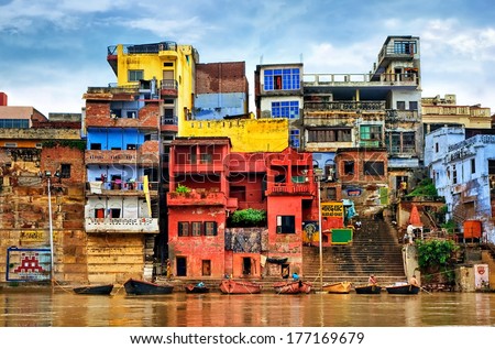 Chaotic colorful houses on the banks of river Ganges, Varanasi, India