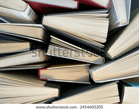 A chaotic yet charming collection of stacked books