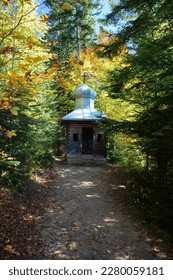 Chapel by Blessed Stone and sacred spring in forest near Manyava Skete in Western Ukraine, regarded as place of prayer and of spiritual purification. Spring of healing water emits from underneath it - Shutterstock ID 2280059181