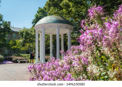 Chapel Hill / NC / USA - August 31, 2019: People Visiting The Old Well, A Landmark At The University Of Chapel Hill.