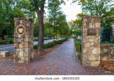 Chapel Hill, NC / USA - October 23, 2020: Stone Entrance To The University Of North Carolina Chapel Hill With Brick Sidewalk