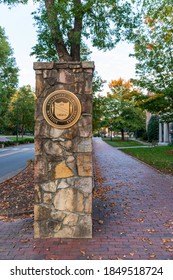 Chapel Hill, NC / USA - October 23, 2020: Stone Entrance To The University Of North Carolina Chapel Hill With Brick Sidewalk