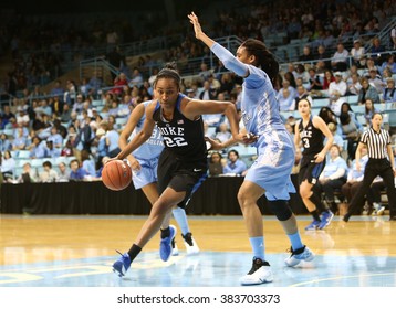 CHAPEL HILL, NC-FEB 28: Duke Blue Devils Forward Oderah Chidom (22) Dribbles The Ball As UNC Tar Heels Forward Hillary Summers (30) Defends On February 28, 2016 At Carmichael Arena.