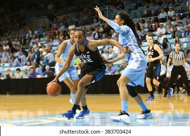 CHAPEL HILL, NC-FEB 28: Duke Blue Devils Forward Oderah Chidom (22) Dribbles The Ball As UNC Tar Heels Forward Hillary Summers (30) Defends On February 28, 2016 At Carmichael Arena.