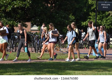 Chapel Hill, NC/USA- 08/28/2018: Students At UNC Chapel Hill Walk Around Campus As Noon Approaches. 