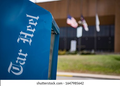 Chapel Hill, North Carolina - February 3 2020: UNC Tar Heel Text Outside Basketball Arena Flags