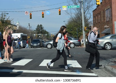 Chapel Hill,NC/United States- 02/06/2019: A Group Of College Students Across Franklin Street In Downtown Chapel Hill.