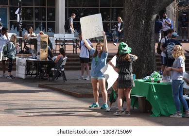 Chapel Hill,NC/United States- 02/06/2019: A Sorority Girl At UNC-Chapel Hill Holds Up A Sign For A Social Function. 