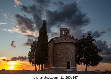 Chapel of the Madonna di Vitaleta in Tuscany at sunset