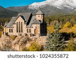 Chapel on the Rock, Church of Saint Malo near Estes Park. Season changing from autumn to winter. Rocky Mountains, Colorado, USA. 
