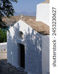The Chapel of Saint George Pachymachiotis is a chapel and a church in the Greek town of Lindos, dedicated to Saint George. The church was built in the late 14th century.
