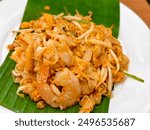 Char Kway Teow
A local Penang dish, Char Kway Teow or Fried Kuey Teow served on top of banana leaf plate with big prawn.