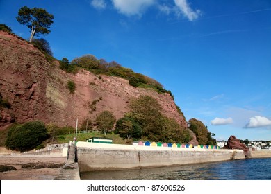 Characteristic Red Cliffs On The South Devon Coast