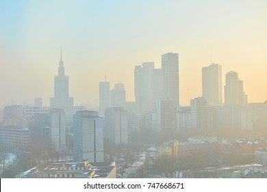 Characteristic view of a modern city skyline covered in a dense smog and pollution - Warsaw, Poland - Powered by Shutterstock