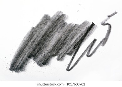 Charcoal artwork equipment on a white paper