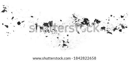 Charcoal dust. Black coal powder scattered, isolated on a white background. Wooden charcoal. 