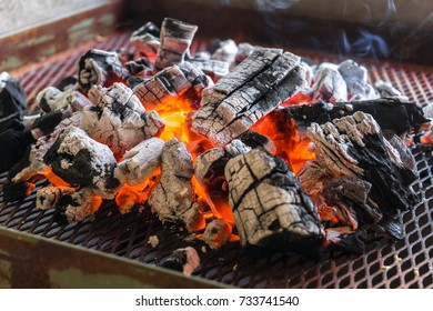 Charcoal With Fire On A Grill