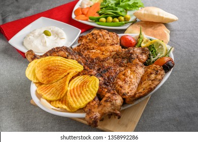 Charcoal Grilled Chicken With Sliced Potatoes