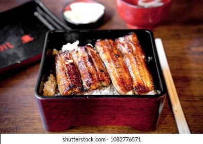 Charcoal Grilled Unagi Eel Over Rice Or Japanese Unagi Donburi (Unadon) Rice Recipe, Famous Street Food Of Narita, Chiba, Japan.