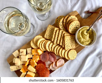 Charcuterie Board With Assorted Meats, Cheeses And Crackers; Top Down View