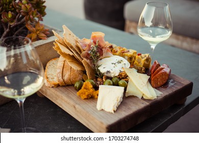 Charcuterie Board And Cheese With Wine