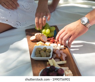 Charcuterie Board People At A Outdoor Picnic 