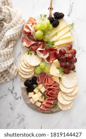 Charcuterie Board With Variety Of Cheese And Meats