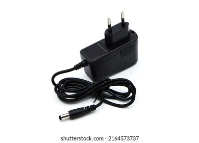 Charger isolated on white background. AC - DC Adapter.