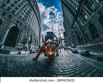 Charging Bull is a bronze sculpture that stands on Broadway, north of Bowling Green in the Financial District of Manhattan, Wall Street, New York, United States. 01.17.2021