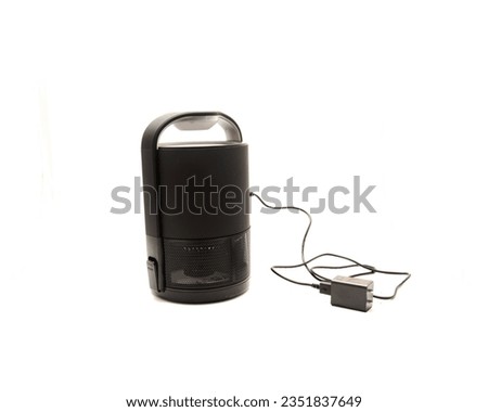 Charging cable and brand-new fly and mosquitos trap using electric to simulate heat and wavelengths with bottom sticky glue boards to kill insects isolated on white background. Pests mosquito zapper