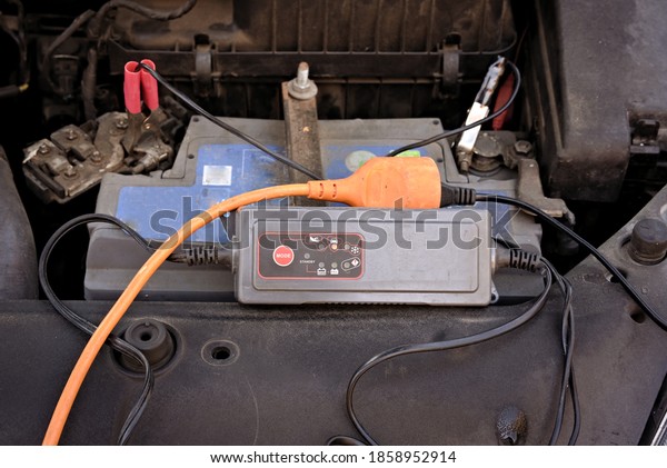charging the car\
battery with a small\
charger