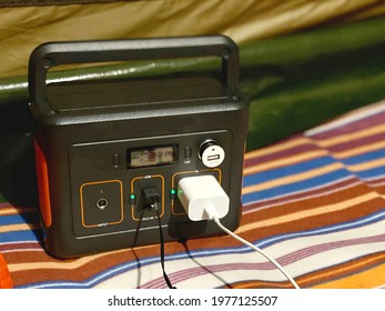 Charging cord plugged into a portable power supply