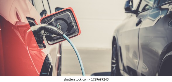 charging an ecological car with an electric motor at the charging station
