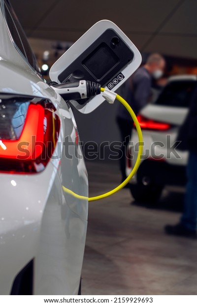 Charging for an\
electric car. Modern\
technologies.