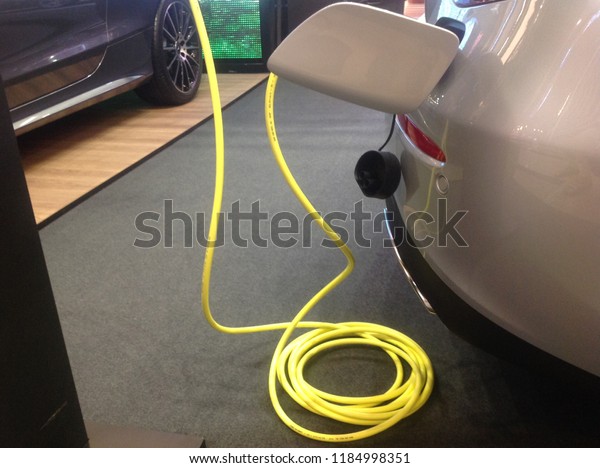 Charging\
Electric Car With the power Electric Cable\
