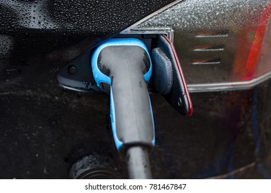 Charging electro car - Shutterstock ID 781467847