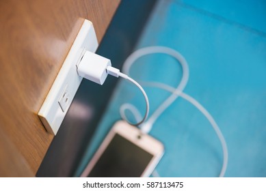 Charging Smart Phone In Selective Focus.