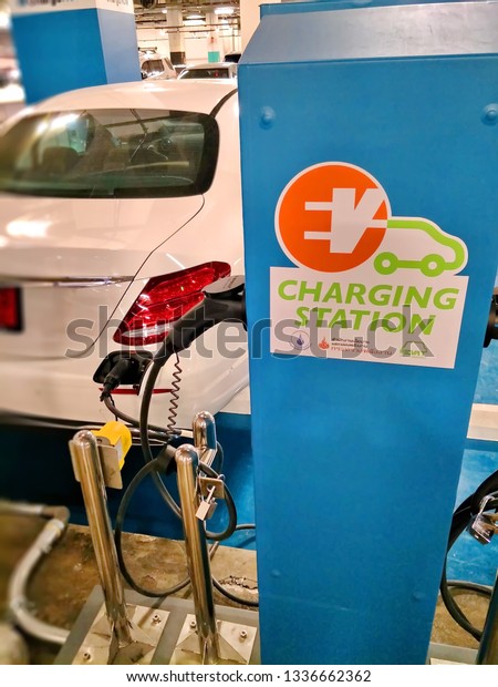 Charging\
station for electric car in the indoor car parking of shopping\
center at Chiang Mai,Thailand.Mar\
12,2019.
