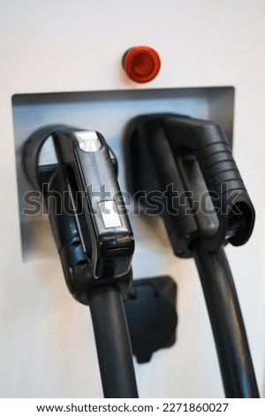 Charging station for electric cars with plugs close view