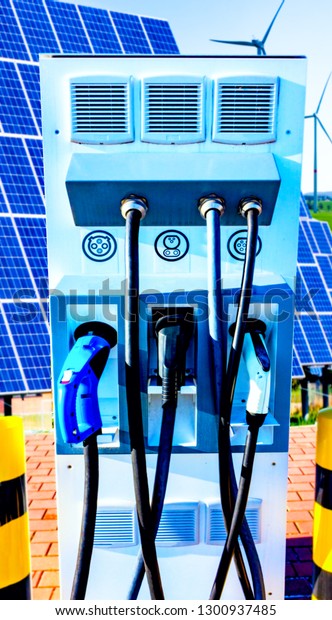 Charging station for electric cars . Power\
service station . Wind turbine . solar\
panel