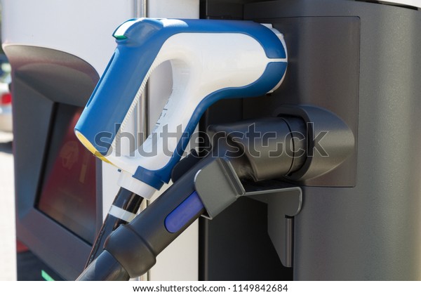 Charging station for electric vehicles, electro\
car charging station on gas\
station.