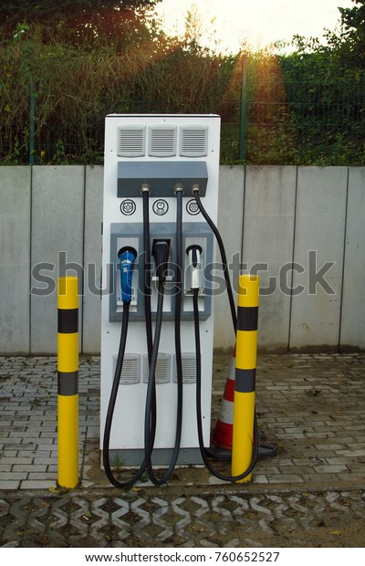 Charging station for electric vehicles, electro
car charging station on gas station. New technologies in everyday
life,  environmentally friendly and ecologically pure ways of using
energy
