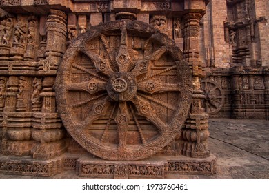 A chariot wheel carved into the wall of the 13th century Konark Sun or surya Temple, Odisha, India.