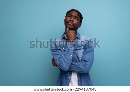 Similar – Young black man listening to music