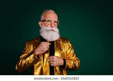 Charismatic elderly gentleman in golden suit celebrating in style on green background - Powered by Shutterstock