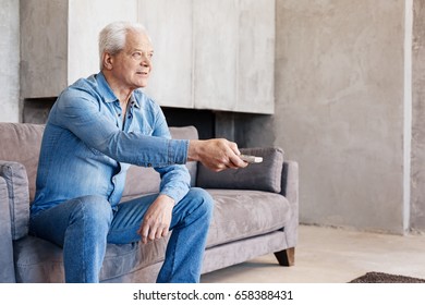 Charismatic Emotional Guy Watching TV