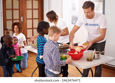 Charity, children and volunteer with food for donation, nonprofit organization and serving kids. Social responsibility, community service and people in kindergarten, school and outreach programme - Powered by Shutterstock