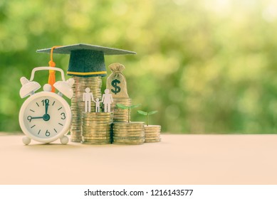 Charity For Education, Donate For Child Education Concept : Black Graduation Cap, US Dollar Money Bag, Family Member Paper Cut, White Clock And Coins, Depicts Financial Aid And Opportunity Give To Kid