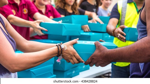 Charity And Giving Is An Integral Part Of The Holy Month Of Ramadan: Distributing Donated Food Packages To Workers. Dubai, United Arab Emirates - 17/JUL/2016